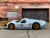 Loose Hot Wheels 1967 Ford GT40 MK.IV Race Car Dressed in Blue and Orange Gulf Livery