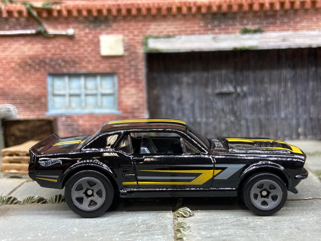 Loose Hot Wheels 1967 Ford Mustang GT Dressed in Black and Yellow