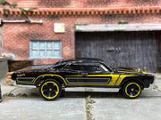 Loose Hot Wheels 1967 Pontiac GTO Dressed in Black and Yellow