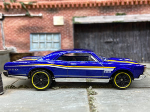Loose Hot Wheels 1967 Pontiac GTO Dressed in Blue, Yellow and White