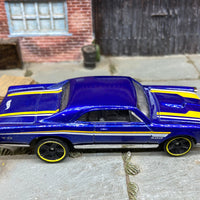 Loose Hot Wheels 1967 Pontiac GTO Dressed in Blue, Yellow and White