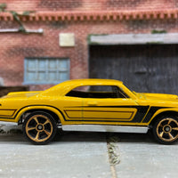 Loose Hot Wheels 1967 Pontiac GTO Dressed in Yellow and Black