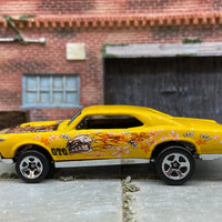 Loose Hot Wheels 1967 Pontiac GTO Dressed in Yellow Flower Power Skull and Flames Livery