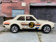 Loose Hot Wheels 1970 Ford Escort RS 1600 Dressed in Off White #3 Gum Ball 3000 Race Livery