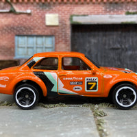 Loose Hot Wheels 1970 Ford Escort RS 1600 Dressed in Orange #7 Rally Race Livery
