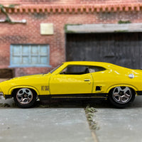 Loose Hot Wheels 1973 Ford Falcon XB Dressed in Yellow and Black