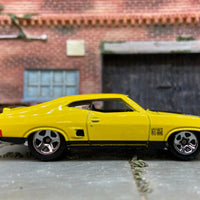 Loose Hot Wheels 1973 Ford Falcon XB Dressed in Yellow and Black