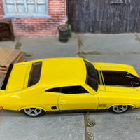 Loose Hot Wheels 1973 Ford Falcon XB Dressed in Yellow and Black