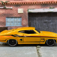 Loose Hot Wheels 1973 Ford Falcon XB Dressed in Yellow and Black