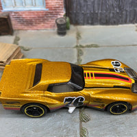 Loose Hot Wheels 1976 Chevy Corvette Greenwood Dressed in Gold, Black and Red 76
