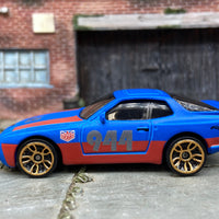Loose Hot Wheels 1989 Porsche 944 Turbo Dressed in Blue and Red Urban Outlaw Livery
