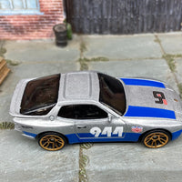 Loose Hot Wheels 1989 Porsche 944 Turbo Dressed in Silver and Blue Urban Outlaw Livery