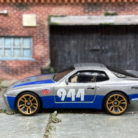 Loose Hot Wheels 1989 Porsche 944 Turbo Dressed in Silver and Blue Urban Outlaw Livery