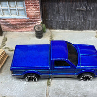 Loose Hot Wheels 1991 GMC Syclone Pick Up Truck Dressed in Blue and Silver