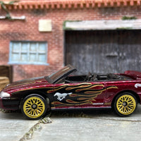 Loose Hot Wheels 1996 Ford Mustang GT Convertible Dressed in Dark Red with Flames
