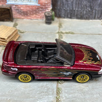 Loose Hot Wheels 1996 Ford Mustang GT Convertible Dressed in Dark Red with Flames