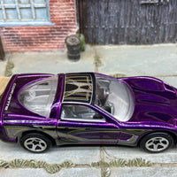Loose Hot Wheels 1997 Chevy Corvette Dressed in Purple, Black and Silver