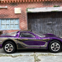 Loose Hot Wheels 1997 Chevy Corvette Dressed in Purple, Black and Silver