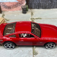 Loose Hot Wheels 2005 Ford Mustang GT Dressed in Dark Red
