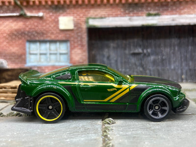 Loose Hot Wheels 2005 Ford Mustang Race Car Dressed in Green, Black and Yellow