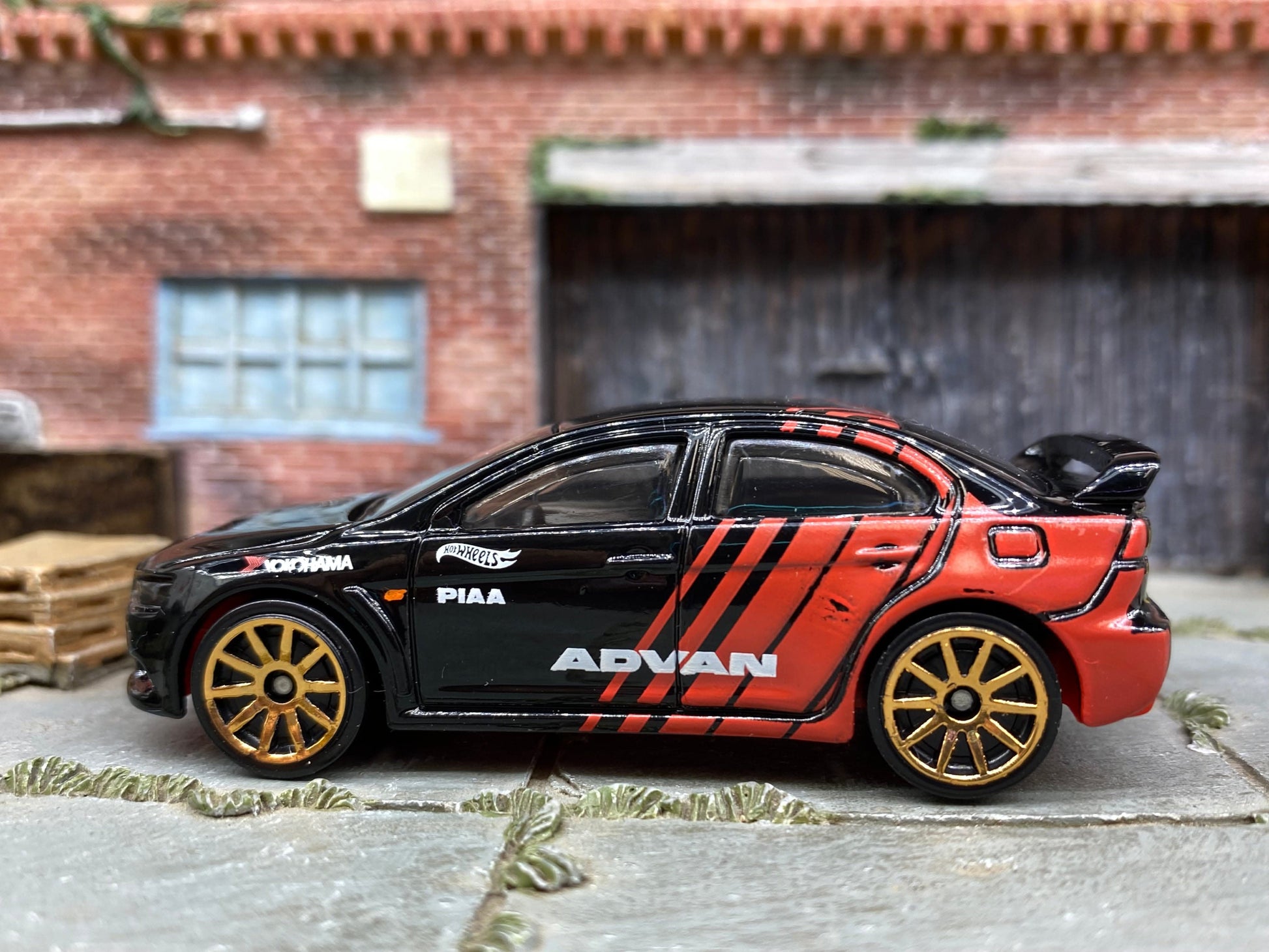 Loose Hot Wheels - 2008 Mitsubishi Lancer Evalution - Advant Black and Red