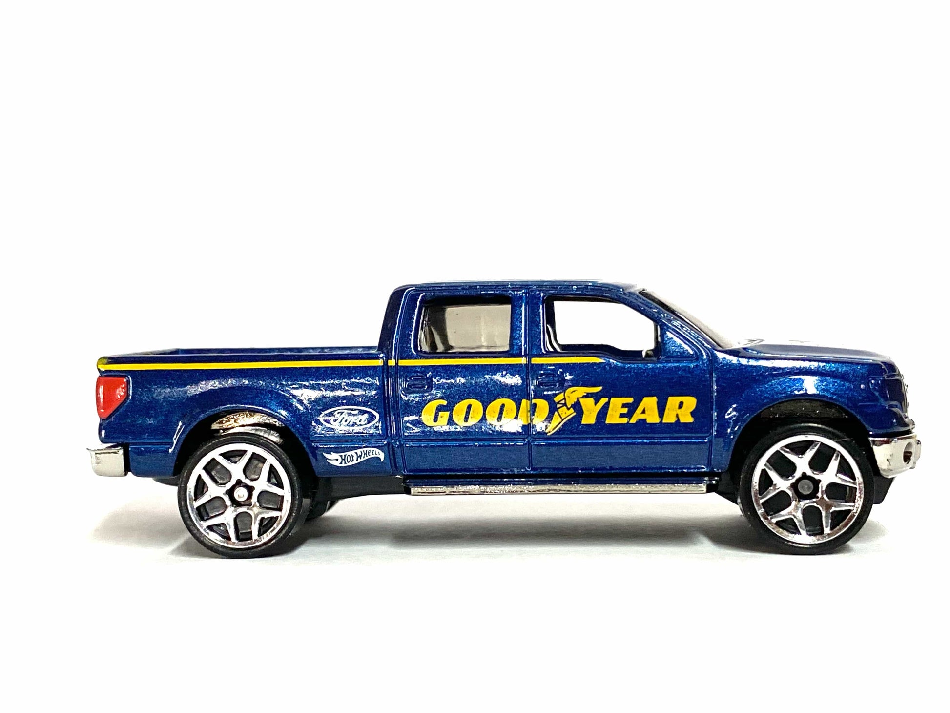 Loose Hot Wheels - 2009 Ford F150 - Blue and Yellow Goodyear Livery