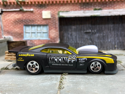 Loose Hot Wheels 2010 Pro-Stock Chevy Camaro Drag Car Dressed in Satin Black and Yellow Mooneyes Livery