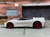 Loose Hot Wheels 2014 Chevy Corvette Stingray Dressed in White and Red