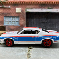 Loose Hot Wheels AMC Rebel Machine Dressed in White, Blue and Red Goodyear Livery