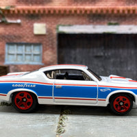 Loose Hot Wheels AMC Rebel Machine Dressed in White, Blue and Red Goodyear Livery