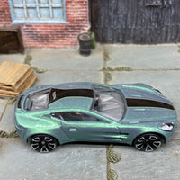 Loose Hot Wheels Aston Martin One-77 Dressed in Pearl Green and Black