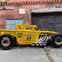 Loose Hot Wheels: Bone Shaker Hot Rod Truck Dressed in Yellow Moon Eyes Livery