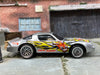 Loose Hot Wheels Camaro Z28 Dressed in Silver Fire Eater Flame Livery