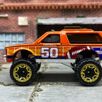 Loose Hot Wheels Chevy Blazer 4×4 - Orange Football 50