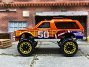 Loose Hot Wheels Chevy Blazer 4×4 - Orange Football 50