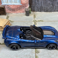 Loose Hot Wheels Chevy Corvette C7 Z06 Convertible Dressed in Dark Blue
