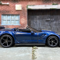 Loose Hot Wheels Chevy Corvette C7 Z06 Convertible Dressed in Dark Blue