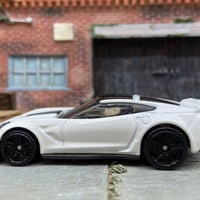 Loose Hot Wheels Chevy Corvette C7 Z06 Dressed in White and Black