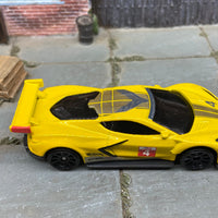 Loose Hot Wheels Chevy Corvette C8-R Race Car Dressed in Yellow 4