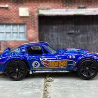 Loose Hot Wheels Chevy Corvette Grand Sport Dressed in Hot Wheels Blue Livery