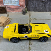 Loose Hot Wheels Chevy Corvette Grand Sport Roadster Dressed in Yellow and Black