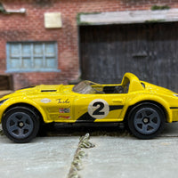 Loose Hot Wheels Chevy Corvette Grand Sport Roadster Dressed in Yellow and Black
