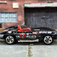 Loose Hot Wheels Chevy Corvette Stingray Dressed in Black, White and Red