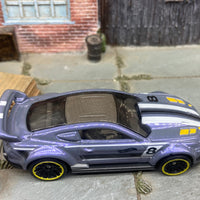 Loose Hot Wheels Custom 2015 Ford Mustang Race Car Dressed in Purple, White and Black