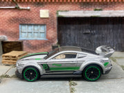 Loose Hot Wheels Custom 2015 Ford Mustang Race Car Dressed in Silver, Green and Black