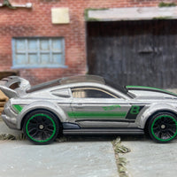 Loose Hot Wheels Custom 2015 Ford Mustang Race Car Dressed in Silver, Green and Black