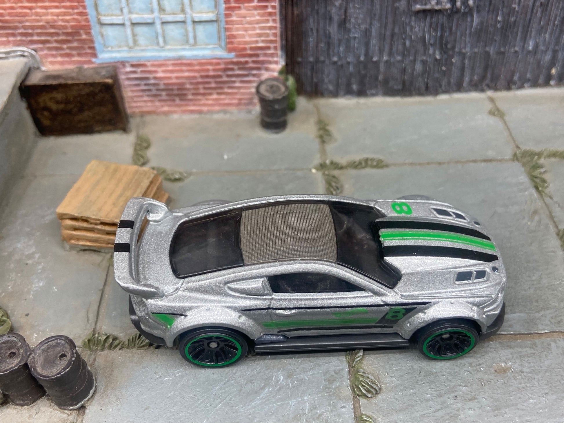 Loose Hot Wheels Custom 2015 Ford Mustang Race Car Dressed in Silver, Green and Black