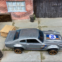 Loose Hot Wheels Custom Ford Maverick Dressed in Silver #94 Greddy Livery