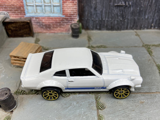 Loose Hot Wheels Custom Ford Maverick Dressed in White and Blue