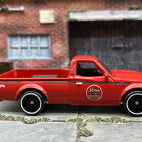 Loose Hot Wheels Datsun 620 Mini Truck - NGK Primer Red